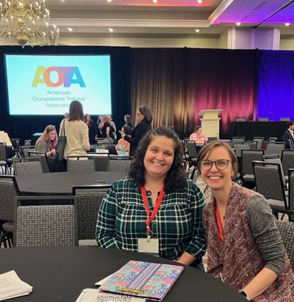 Dr. Amanda Davis, assistant professor in MGA’s Master of Science in Occupational Therapy (MSOT) Bridge Program, along with Dr. Paula Graham from Pfeiffer University, at the American Occupational Therapy Association Education Summit.